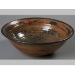 TIM MORRIS (1941 - 1990): A STONEWARE REDUCTION GLAZE SALAD BOWL, 13cm high, 31,5cm diameter.