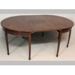 A GEORGE III MAHOGANY EXTENDING DINING TABLE, comprising two D-ends and two extending leaves, with