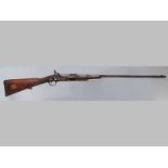 A 19TH CENTURY ENGLISH .451 WHITWORTH PERCUSSION RIFLE, the octagonal breech tapering to circular,