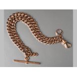 A 9CT PINK GOLD WATCH CHAIN, with fancy links and T-bar, complete with dog clasp, 36.5cm long, 35.