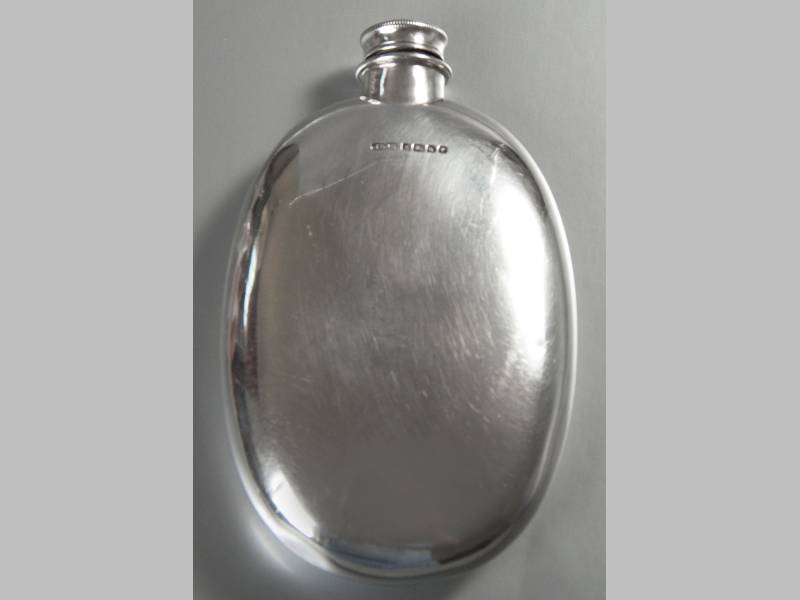 A VICTORIAN SILVER HIPFLASK, SHEFFIELD 1880, JAMES DIXON & SONS, with removable screw top, of oval