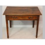 A GEORGE III YEW RECTANGULAR TABLE, the moulded top above a single drawer standing on square
