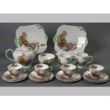 A SHELLEY "HEATHER" PATTERN TEA SET, Circa 1930's, comprising teapot, two sugar basins, two