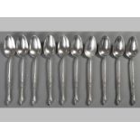 A SET OF TEN CONTINENTAL SILVER TEASPOONS, handles floral emobssed, 216g, (10).