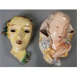 A GOLDSCHEIDER TERRACOTTA ART DECO WALL VASE/MASK, of a lady holding an apple, flanked by twin vases