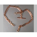A 9CT ROSE GOLD WATCH CHAIN, complete with T-bar and two dog clasps, 40cm long, 49.2g.