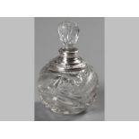 AN EDWARDIAN SILVER MOUNTED AND CUTGLASS PERFUME BOTTLE, LONDON 1904. W.C., body with hobnail,