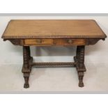 A 19TH CENTURY CONTINENTAL LIBRARY TABLE, POSSIBLY ROSEWOOD, the rectangular top with bobbin