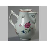 A CHINESE FAMILLE ROSE MILK JUG, decorated in the Meissen style with sprigs of flowers and birds,