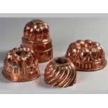 A COLLECTION OF FOUR 19TH CENTURY CAPE COPPER JELLY MOULDS, of various forms and sizes, (4).