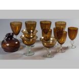A SUITE OF AMBER GLASSES BY NINA CAMPBELL, made in Britain, comprising of ten red wine glasses,