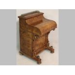 A VICTORIAN WALNUT AND BURR WALNUT DAVENPORT, the rectangular top with a brass gallery rail