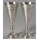 A PAIR OF GEORGE V SILVER KIDDUSH CUPS, CHESTER 1914, J.Z., pinprick engraved, vacant cartouche,