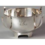 A GEORGE V SILVER BOWL, SHEFFIELD 1912, H.W., fold-over rim, with four applied C-form handles, plain