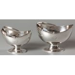 A WILLIAM IV SILVER SUGAR BOWL, LONDON 1831, T.H., with swing-over handle, oval form body, applied