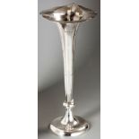 AN EDWARDIAN SILVER TRUMPET VASE, BIRMINGHAM 1905, T.W., wavy rim on a plain elongated body,