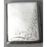 A RUSSIAN SILVER CIGARETTE CASE, engraved with foliage, gilded interior, 10 by 8cm, 161g.