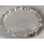 A GEORGE II SILVER SALVER, LONDON 1748, K.M., the applied border embossed with shells, scrolls and