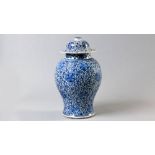 A CHINESE BLUE AND WHITE BALUSTER JAR AND COVER, 19th CENTURY, CIRCA 1850, decorated with flower