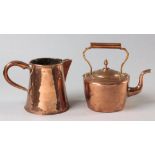 A COPPER WATER JUG, possibly Cape, the cylindrical body on an everted base with a conforming rim,