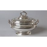 A SILVERPLATE SOUP TUREEN, removable lid decorated with pin prick engraving, with engraved