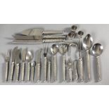 A SET OF DIANA CARMICHAEL STUDDED PEWTER FLATWARE, with beaded handles, comprising: 9 dinner knives,