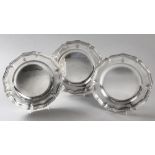 A SET OF THREE DANISH SILVER SALVERS, BY S.M. BENZEN, of circular form with a pie-crust border,