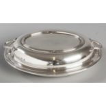 A GEORGE IV SILVER ENTRÉE DISH, BIRMINGHAM 1936, B.B.S.M., of oval form, the lid with twin reeded