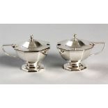 A PAIR OF GEORGE VI SILVER MUSTARD POTS, CHESTER 1937, S & I, of octagonal form, hinged top, C-