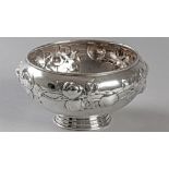 A .830 STD GERMAN SILVER ROSE BOWL, BY L. FELUMB, fold-over rim embossed with fruit in foliage,