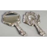 A GEORGE III SILVER HAND MIRROR, NEWCASTLE, 1769, W.N., the back profusely embossed with swags and