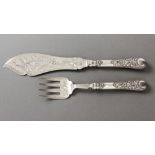 A PAIR OF VICTORIAN SILVER FISH SERVERS, SHEFFIELD 1874, MARTIN HALL & CO., the blade engraved