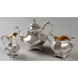 A THREE PIECE SILVERPLATE TEA SET, comprising a teapot, creamer and sugar basin. Teapot: the