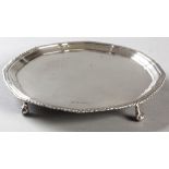 A GEORGE V SILVER SALVER, SHEFFIELD 1934, JR & S., with a wavy gadroon rim, plain well, standing