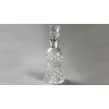 A SILVER COLLARED CUTGLASS DECANTER, BIRMINGHAM 1971, C S.G. & Co., diamond cut pattern, 33cm high.