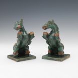 Two Chinese Ceramic Celadon and Russet Glazed Dragons