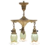 Art Nouveau Style Gilt Brass and Matching Quezal Pulled Feather Shades Three-Light Candelabra