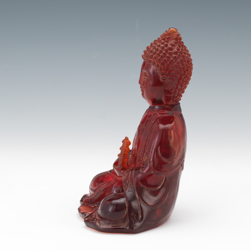 Consolidated Cherry Amber Sculpture of Buddha in Dhyana Mudra Holding Temple - Image 2 of 7