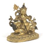 Antique Tibetan Gilt Bronze Figurine of Yellow Jambhala Mammon God of Wealth Buddha on Foo Lion, ca