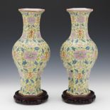 Chinese Famille Jaune Pair of Hexagonal Porcelain Vases on Wood Stands, Apocryphal Qianlong Marks