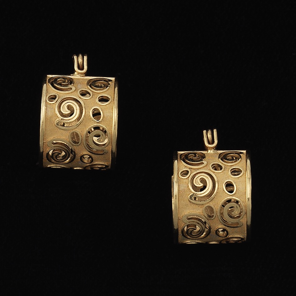 A Pair of Gold Scroll Huggie Earrings