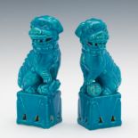 Two Chinese Turquoise Porcelain Foo Dog Cabinet Figurines