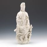 Large Chinese Blanc de Chine Porcelain Ming Style Guanyin in Karana Mudra on Lotus Throne