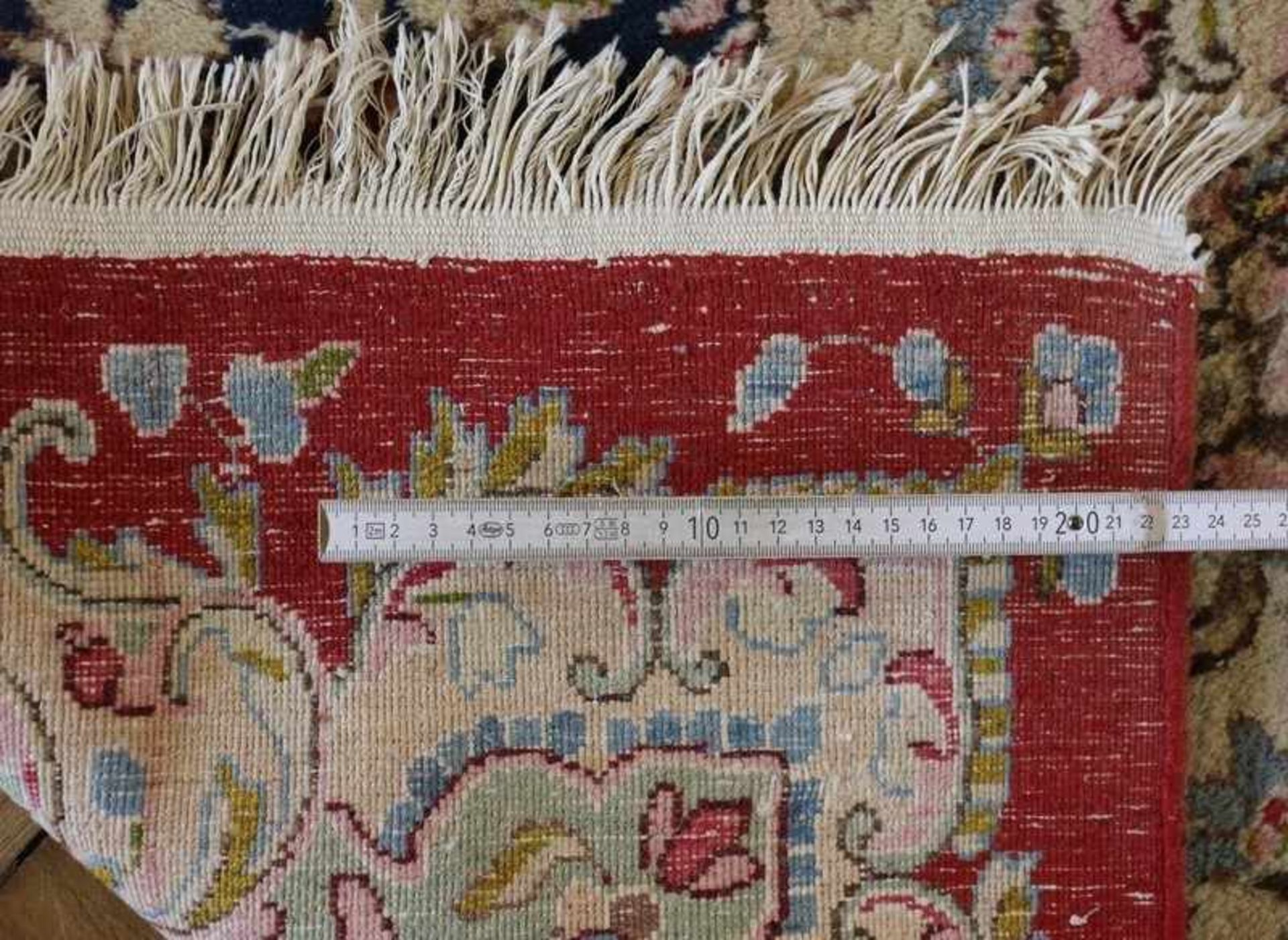 Orientteppich Persien, Kirman, Baumwolle/Wolle, rotgrundiges Feld mit Sternmedaillon, geschweifte - Bild 4 aus 6