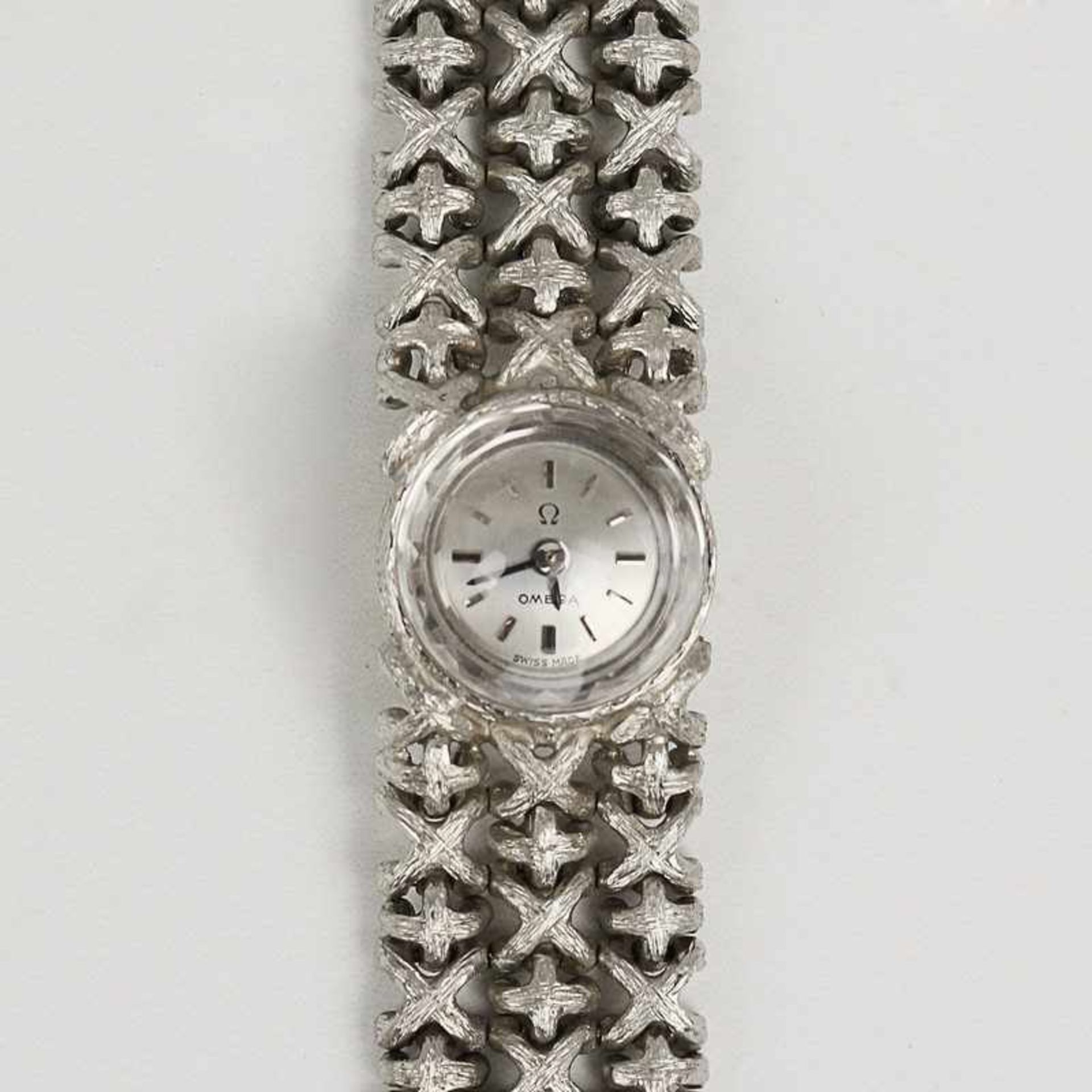 Damenarmbanduhr - Omega Schweiz, rundes Gehäuse, Dca.1,4cm, silberfarbenes Zifferblatt besetzt mit