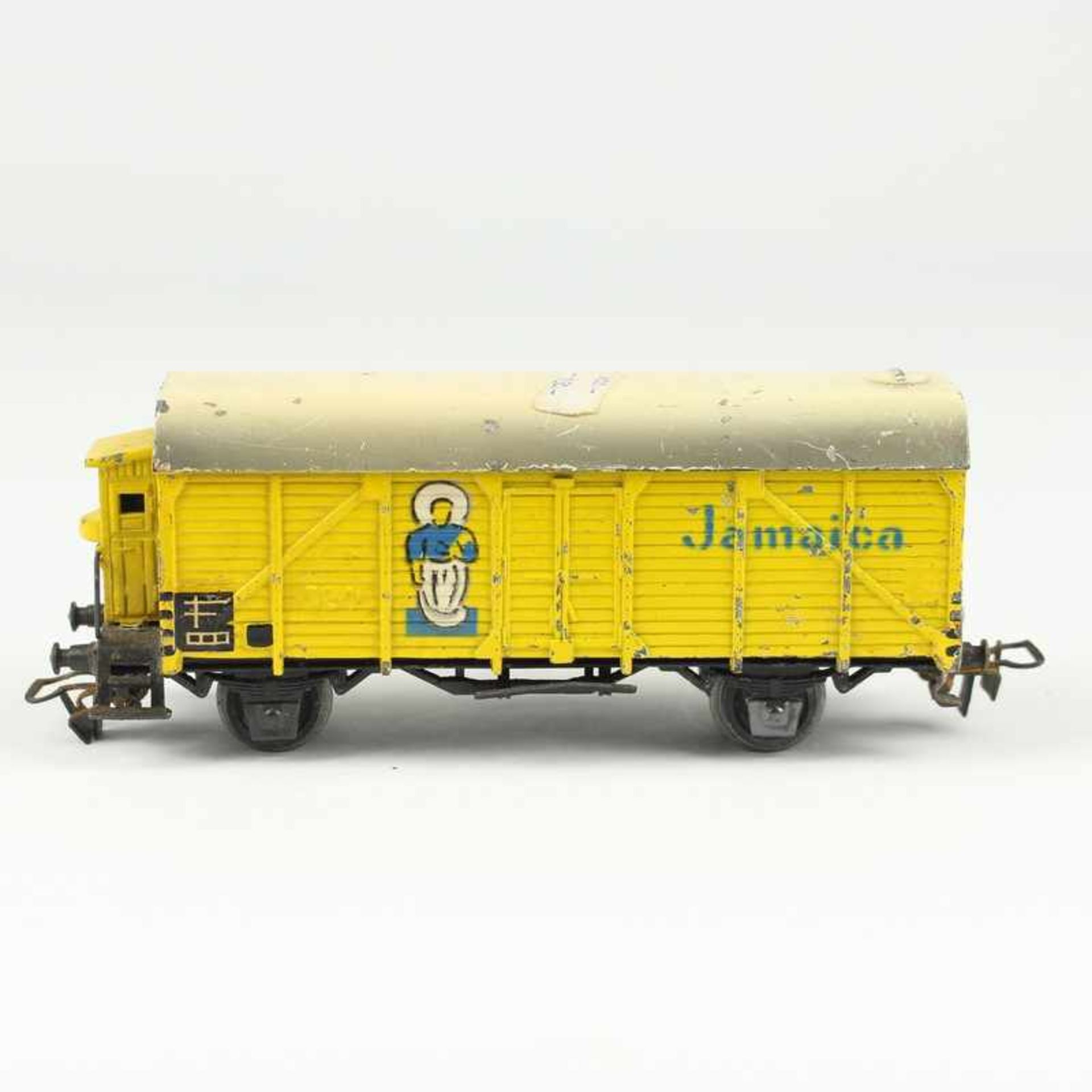 Märklin - Eisenbahn geschlossener Güterwagen 324 mit Bremserhaus, gelber Bananenwagen "Jamaica",