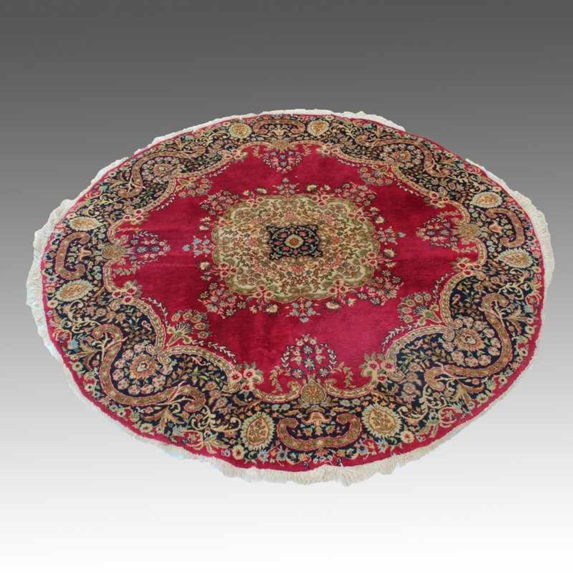 Orientteppich Persien, Baumwolle/Wolle, rund, Floraldekor mit Medaillon, rotgrundig, Fransen besch.,