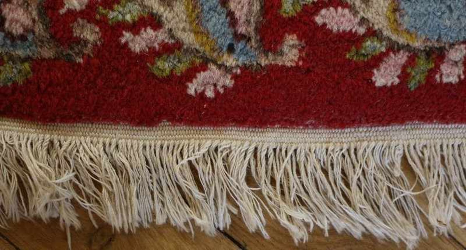 Orientteppich Persien, Kirman, Baumwolle/Wolle, rotgrundiges Feld mit Sternmedaillon, geschweifte - Bild 3 aus 6