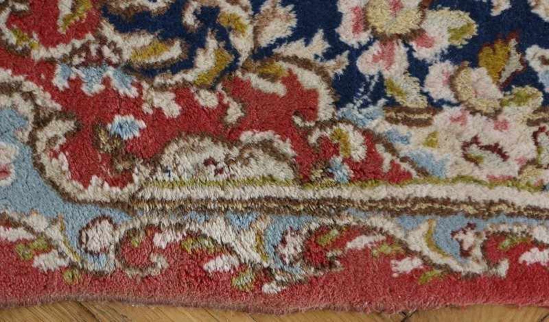 Orientteppich Persien, Kirman, Baumwolle/Wolle, rotgrundiges Feld mit Sternmedaillon, geschweifte - Bild 6 aus 6