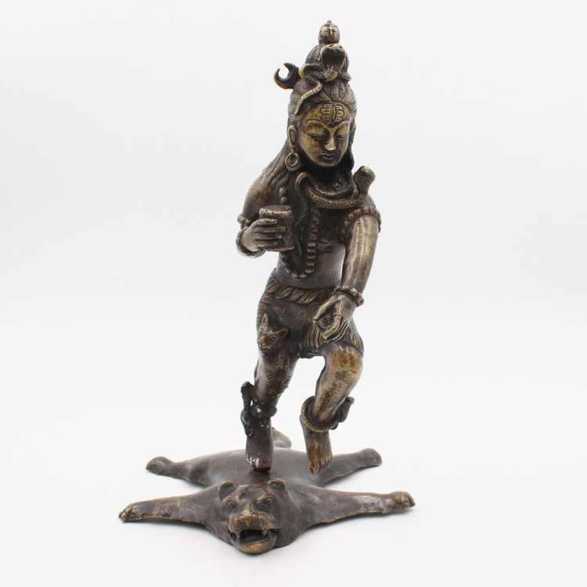 Figur - Hinduismus20.Jh., Bronze, patiniert, vollplastische Figur v. auf dem Tigerfell tanzenden